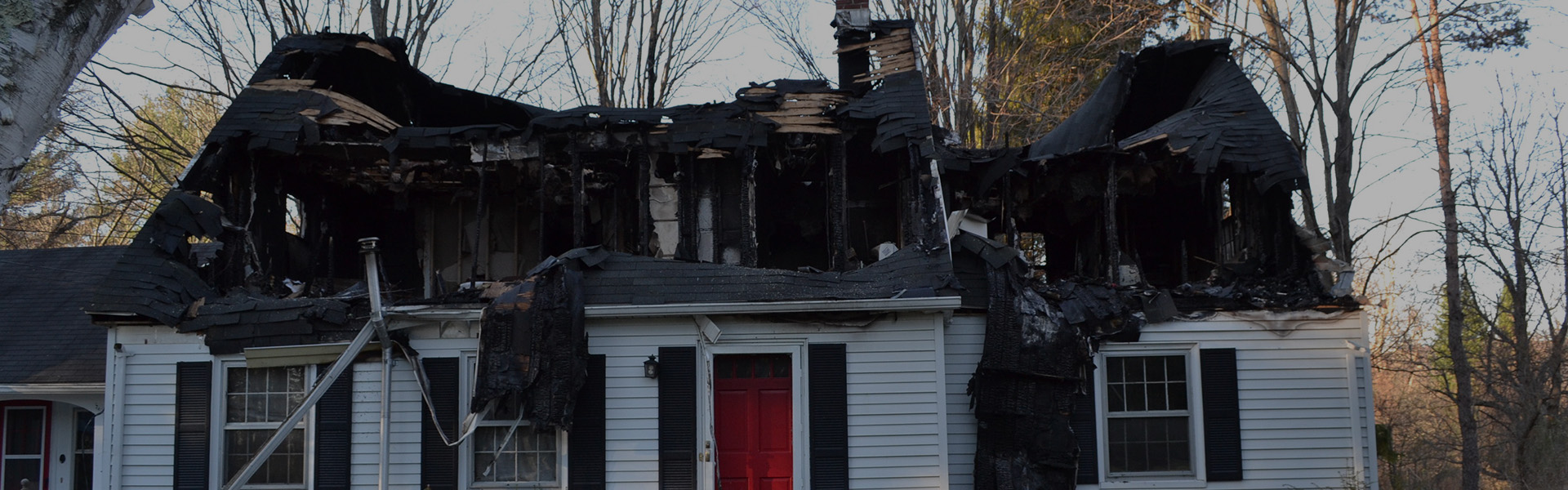 House with Roof Damage